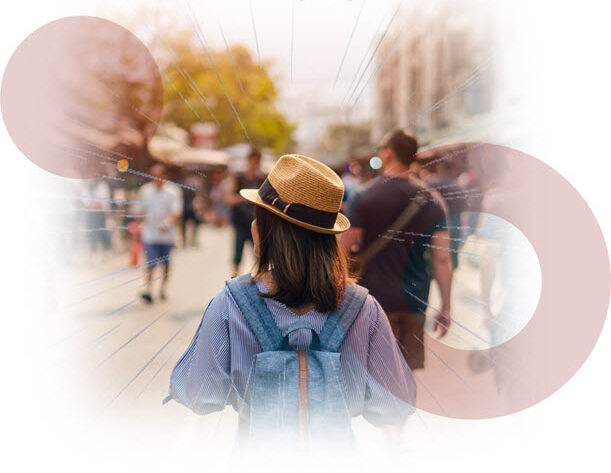 A Generation Z woman walking down a busy street.